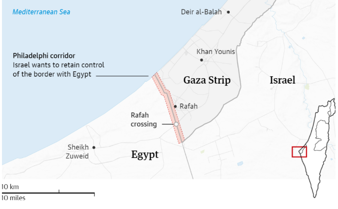 A Map Of The Gaza Strip And Its Surroundings, Including Parts Of Israel And Egypt. The Map Highlights The Rafah Crossing At The Egypt-Gaza Border And The Philadelphi Corridor, Where Israel Seeks To Retain Control. Major Locations Such As Khan Younis And Deir Al-Balah In Gaza And Sheikh Zuweid In Egypt Are Marked. The Map Also Shows The Mediterranean Sea To The Northwest.